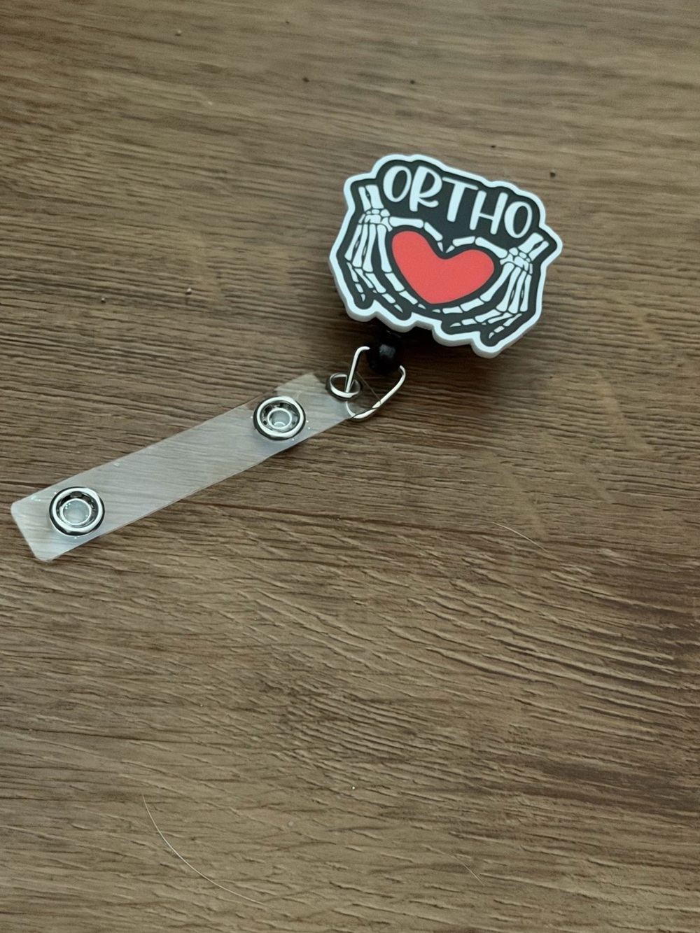 Ortho Heart Badge Reel with Skeleton Hands